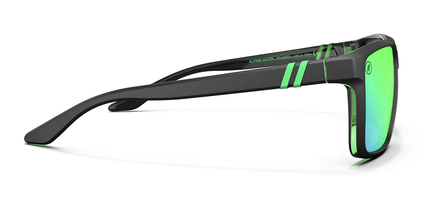 A close up, right side view of the Alpine Moon Blenders Sunglasses showcasing the inside and outside of the matte rubberized black and gloss green frame and polarized green mirrored lenses of the sunglasses.