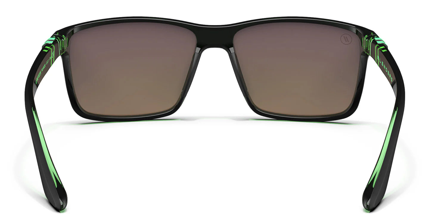 A close up, back view of the Alpine Moon Blenders Sunglasses showcasing the inner sides of the matte rubberized black and gloss green frame and polarized green mirrored lenses of the sunglasses.