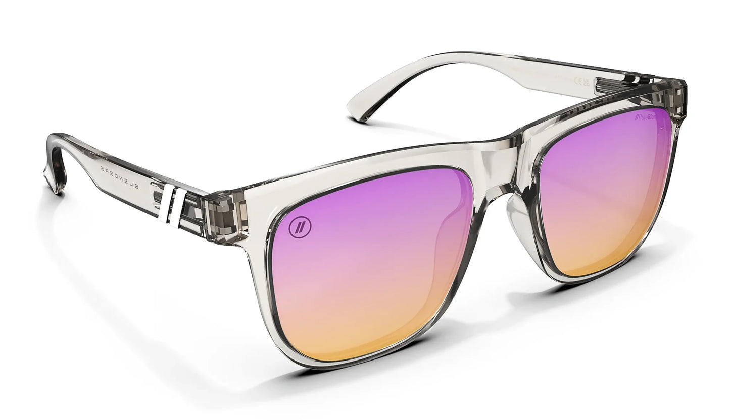 A close up, angled front view of the Dream One Blenders Sunglasses showcasing the inside and outside of the glossy crystal gray frame and PureBlend™ lavender champagne mirrored lenses of the sunglasses.