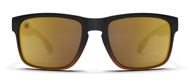 A close up, front view of the Gold Punch Blenders Sunglasses showcasing the matte black to crystal tan fade frame and polarized copper lenses of the sunglasses.
