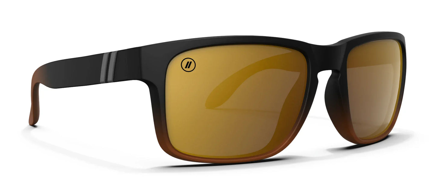 A close up, angled view of the front and right side of the Sterling Lady Blenders Sunglasses showcasing the right side of the matte black to crystal tan fade frame and polarized copper lenses of the sunglasses.