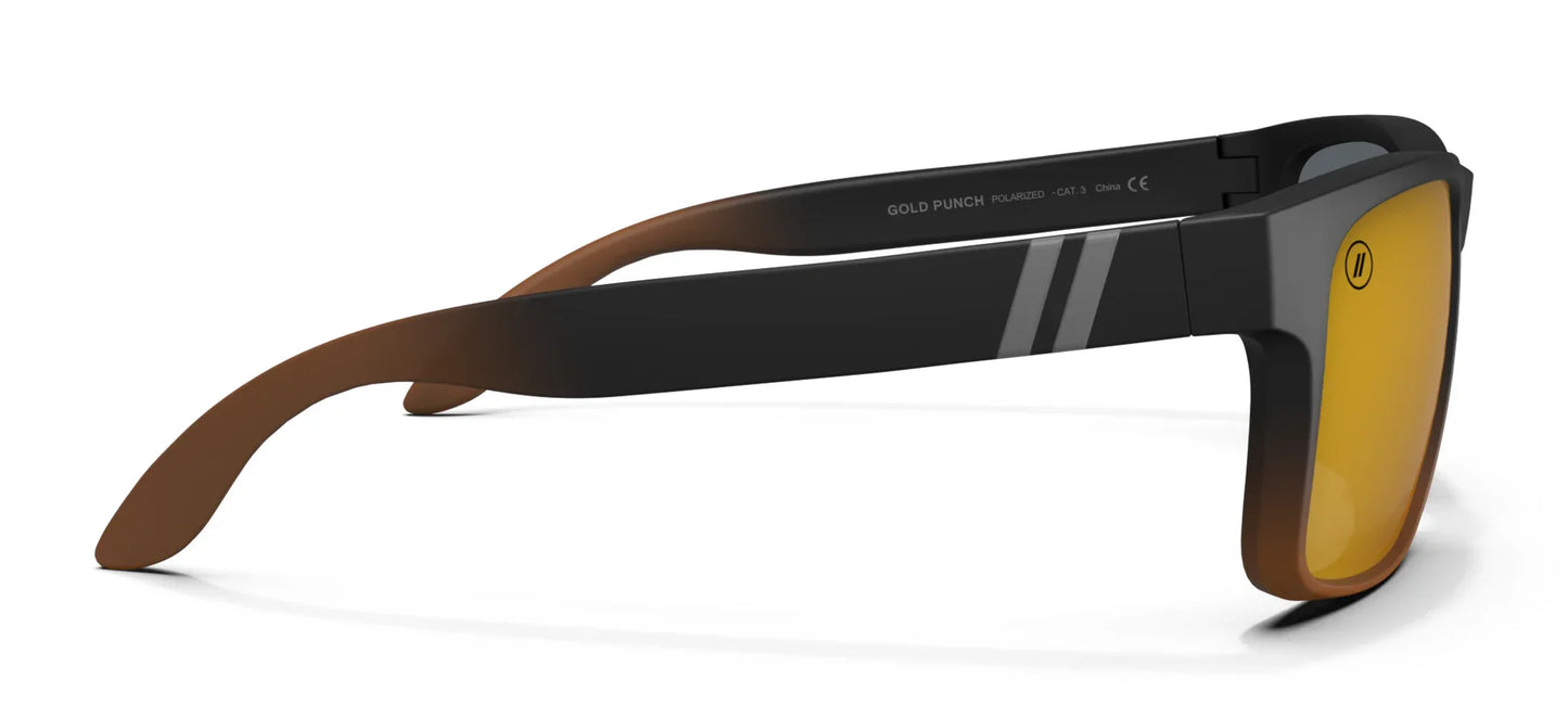 A close up, right side view of the Gold Punch Blenders Sunglasses showcasing the inside and outside of the matte black to crystal tan fade frame and polarized copper lenses of the sunglasses.