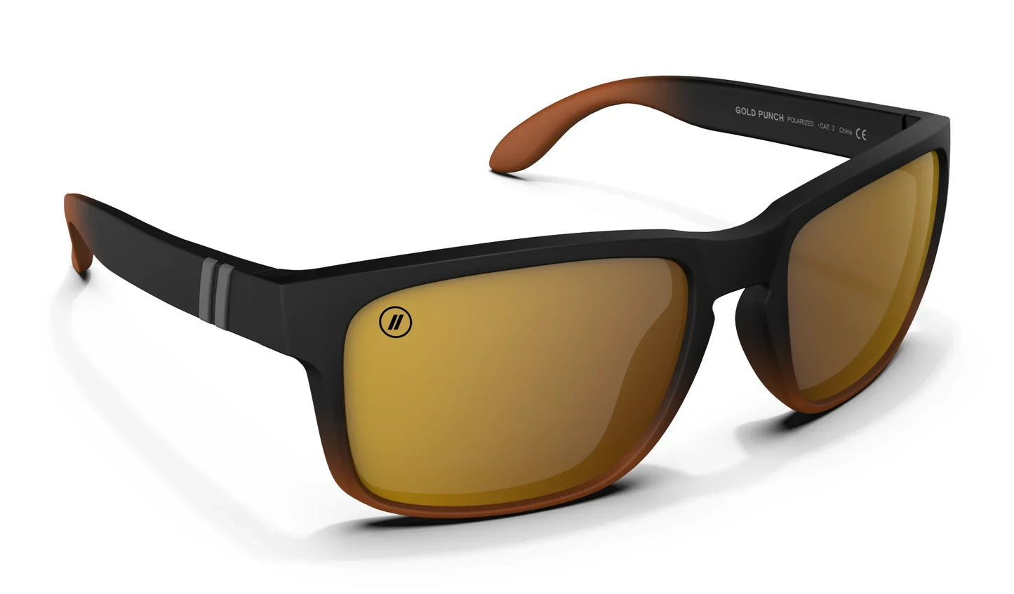 A close up, angled front and side view of the Gold Punch Blenders Sunglasses showcasing the inside and outside of the matte black to crystal tan fade frame and polarized copper lenses of the sunglasses.
