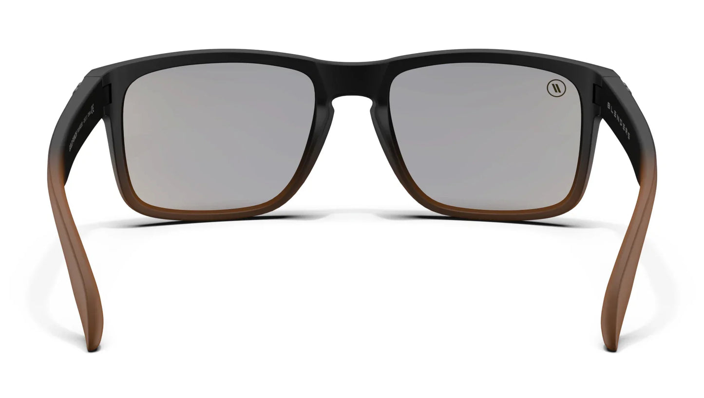 A close up, back view of the Gold Punch Blenders Sunglasses showcasing the inner sides of the matte black to crystal tan fade frame and polarized copper lenses of the sunglasses.