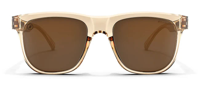 A close up, front view of the Mojave Cove Blenders Sunglasses showcasing the crystal tan frame and PureBlend™ amber lenses of the sunglasses.