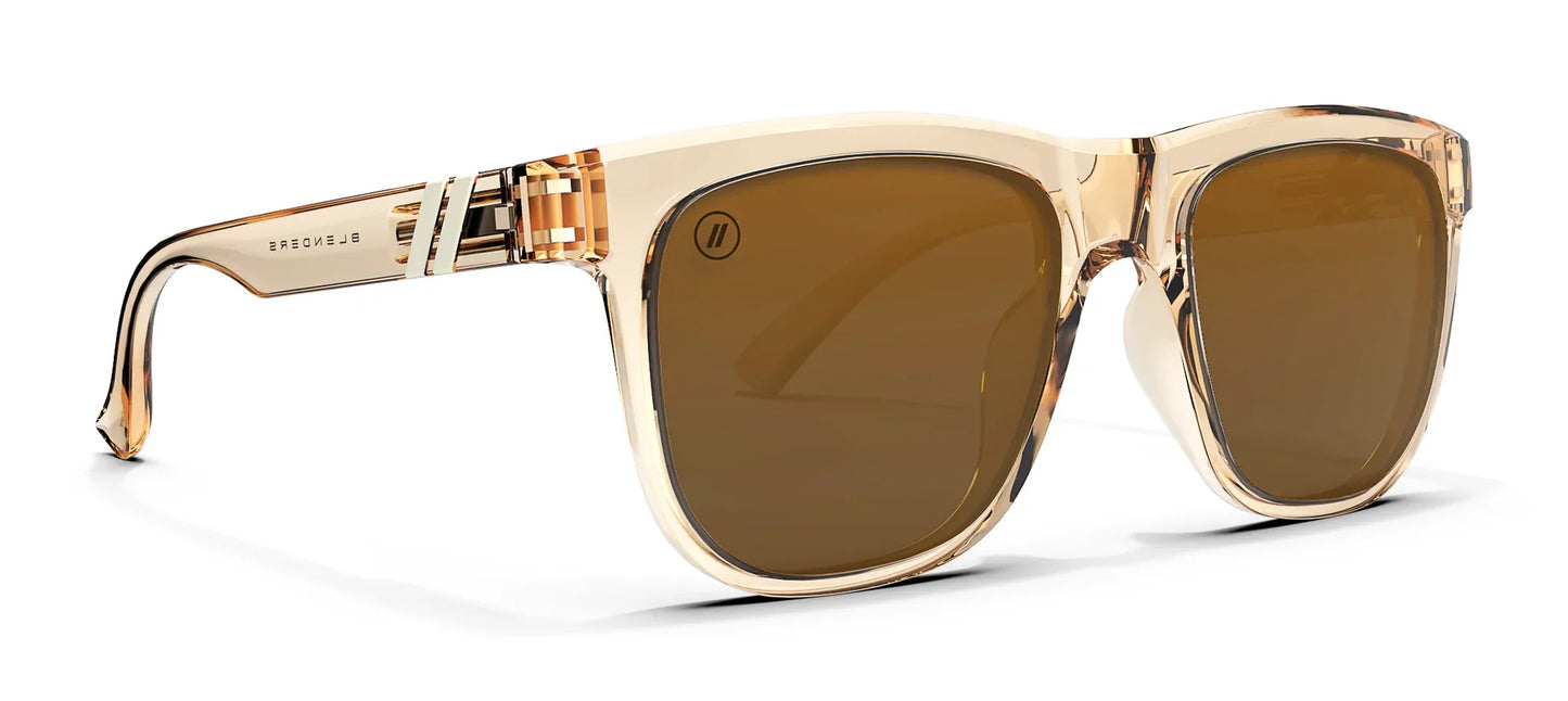 A close up, angled view of the front and right side of the Mojave Cove Blenders Sunglasses showcasing the crystal tan frame and right side of the PureBlend™ amber lenses of the sunglasses.