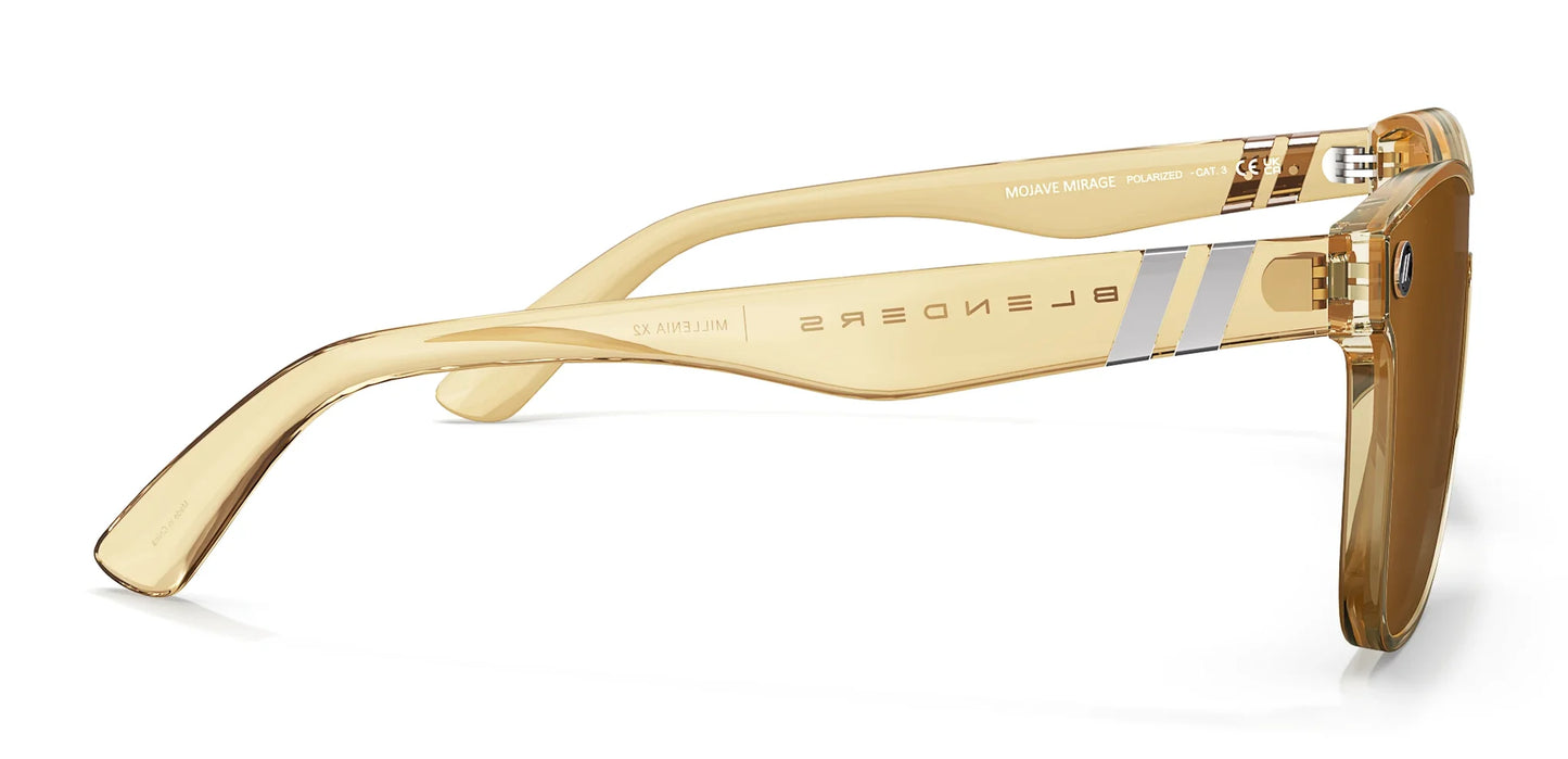 A close up, right side view of the Sterling Lady Blenders Sunglasses showcasing the inside and outside of gloss crystal tan frames and polarized amber lenses of the sunglasses.