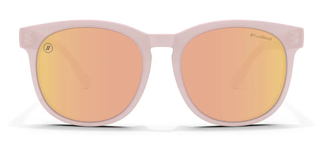 A close up, front view of the Pink Rose Blenders Sunglasses showcasing the gloss milky pink frame and polarized PureBlend™ pink mirror lenses of the sunglasses.