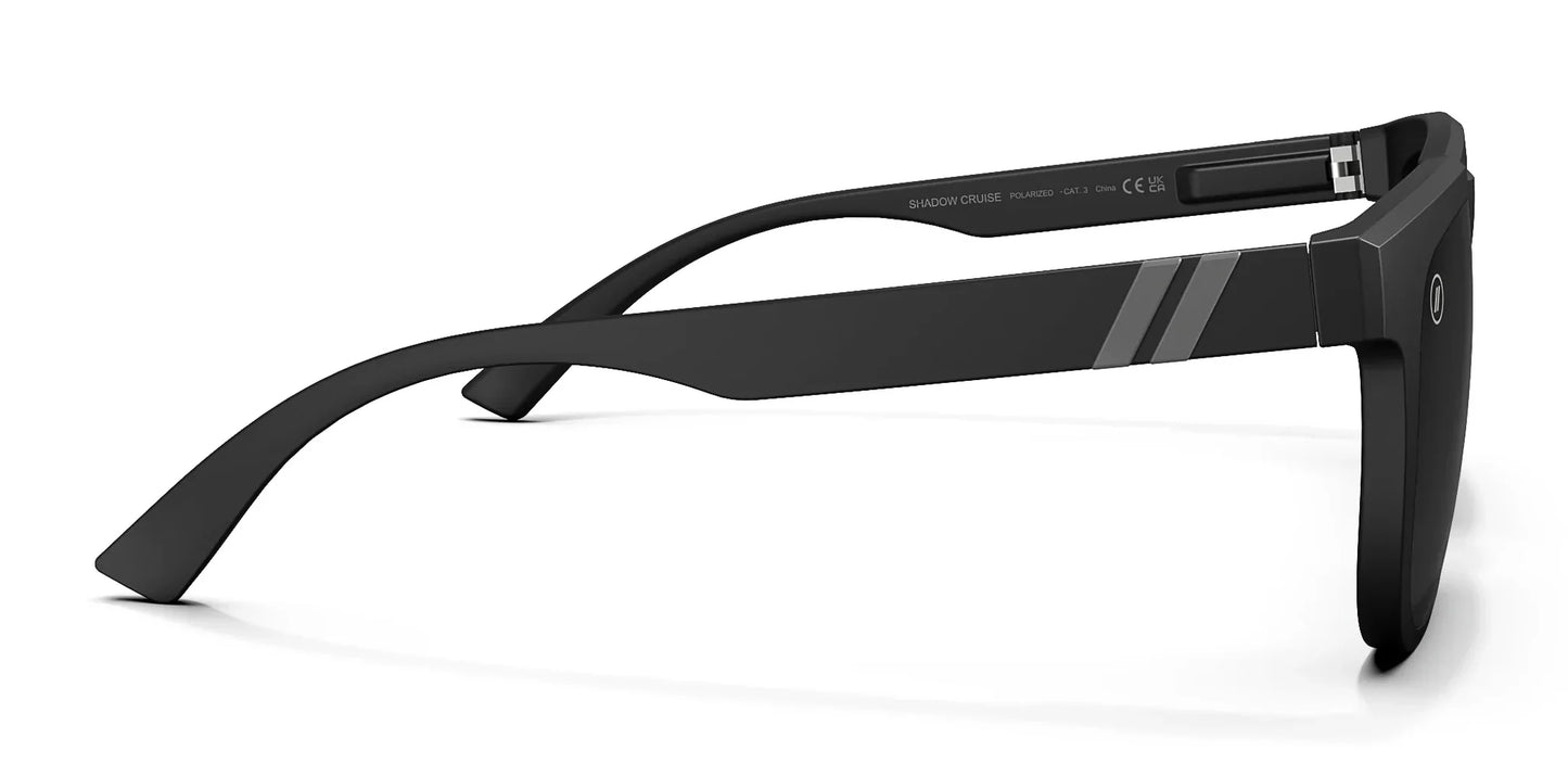 A close up, right side view of the Shadow Cruise Blenders Sunglasses showcasing the inside and outside of the glossy black frame and PureBlend™ smoke black lenses of the sunglasses.