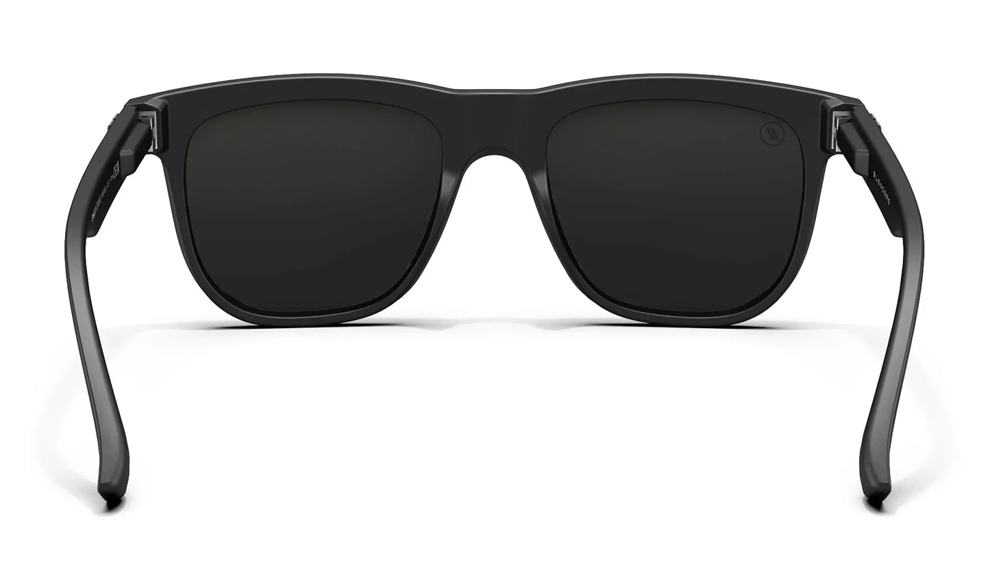 A close up, back view of the Shadow Cruise Blenders Sunglasses showcasing the inner sides of the glossy black frame and PureBlend™ smoke black lenses of the sunglasses.