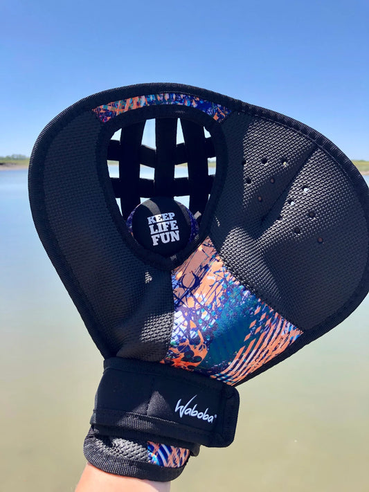 Waboba Catch Ambidextrous Glove with Pro Ball on white background
