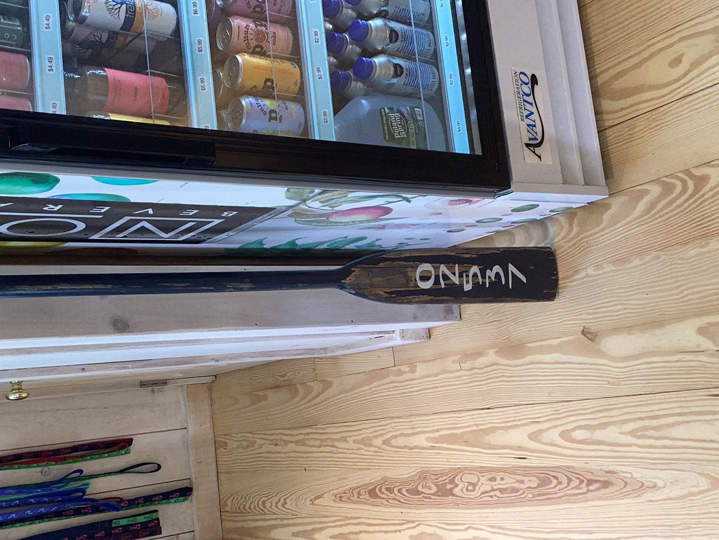 Blue Oar with White Writing