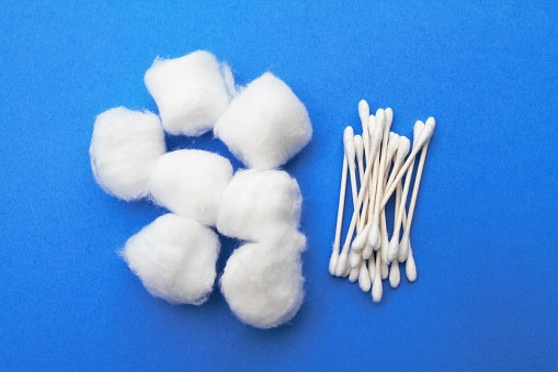 Cotton Balls & Swabs on white background
