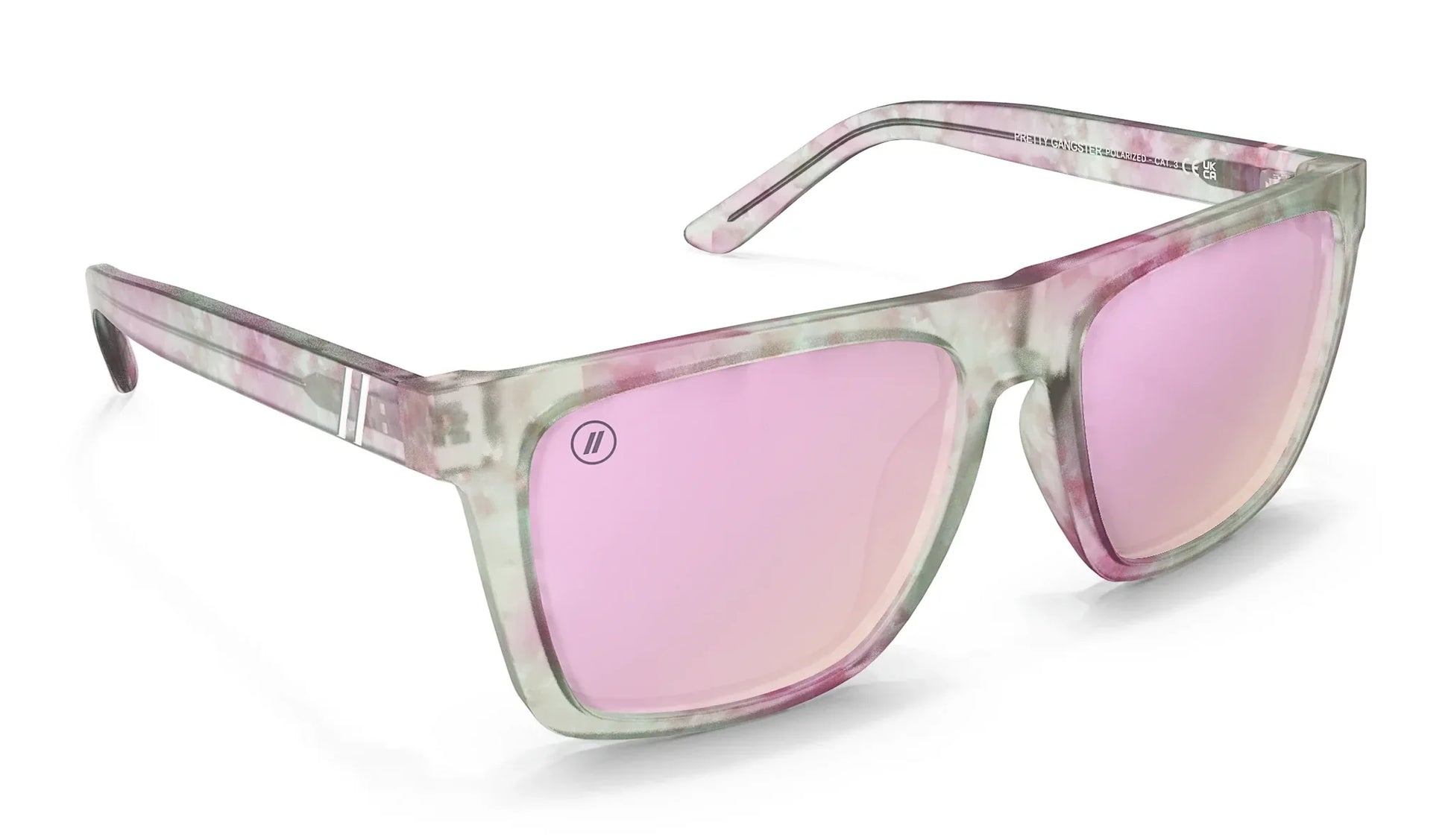 A close up, angled front view of the Pretty Gangsta' Blenders Sunglasses showcasing the inside and outside of the gloss crystal clear gray and pink tortoise frame and polarized pink mirrored lenses of the sunglasses.